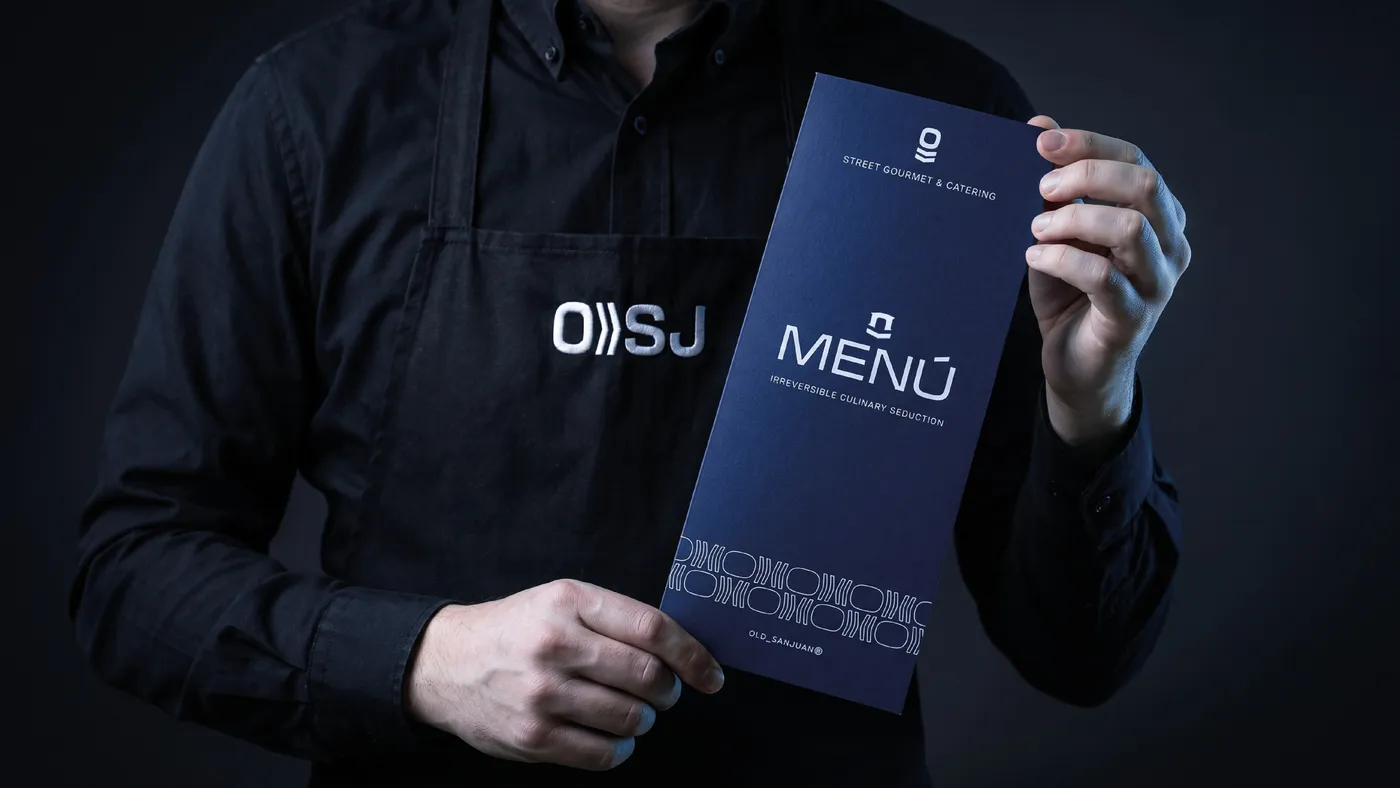 A server presenting the Old San Juan menu